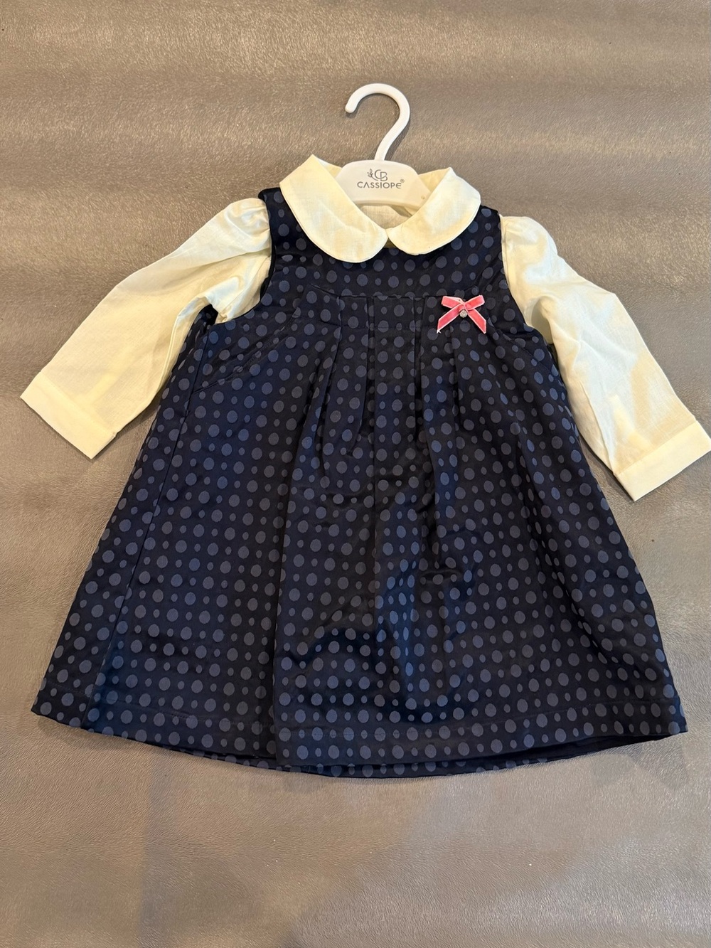 Cassiope Navy Polka Dot Dress with Cream Blouse and Pink Bow. Size 12 months